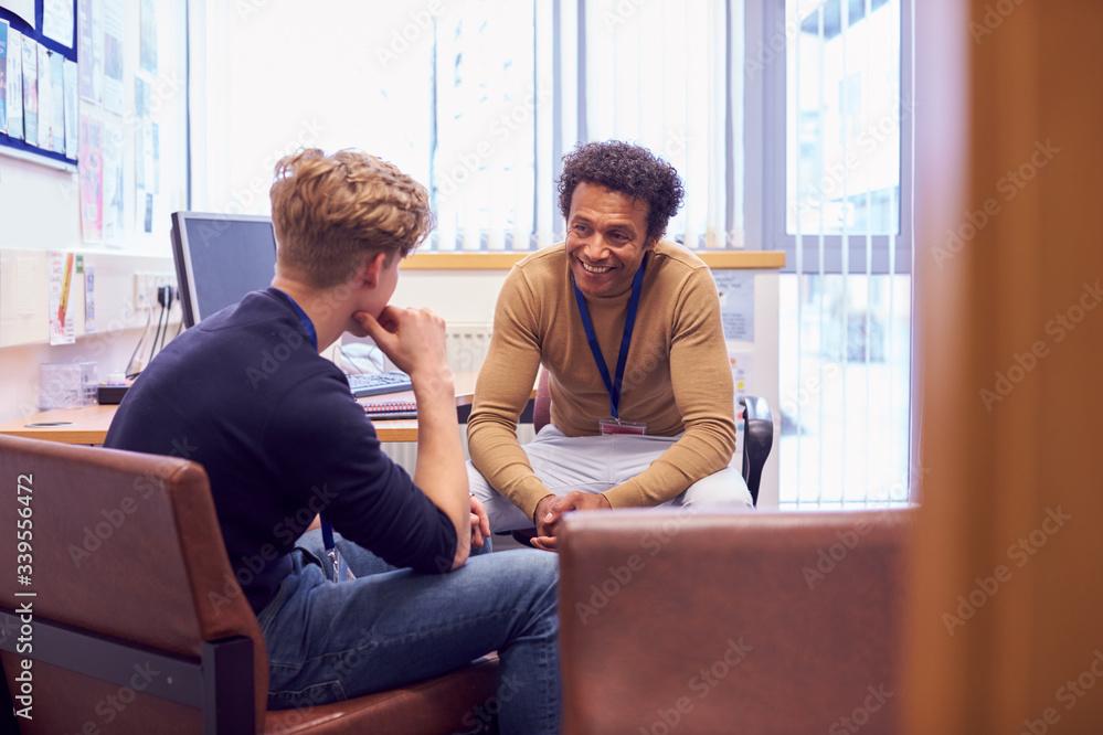 Counselor working with student